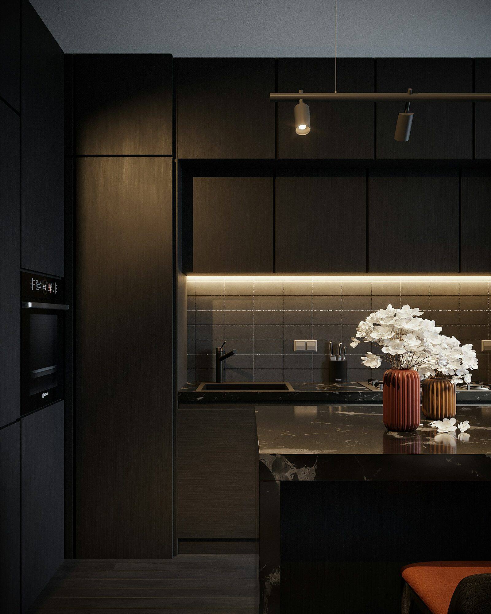Columna de hornos y muebles negros